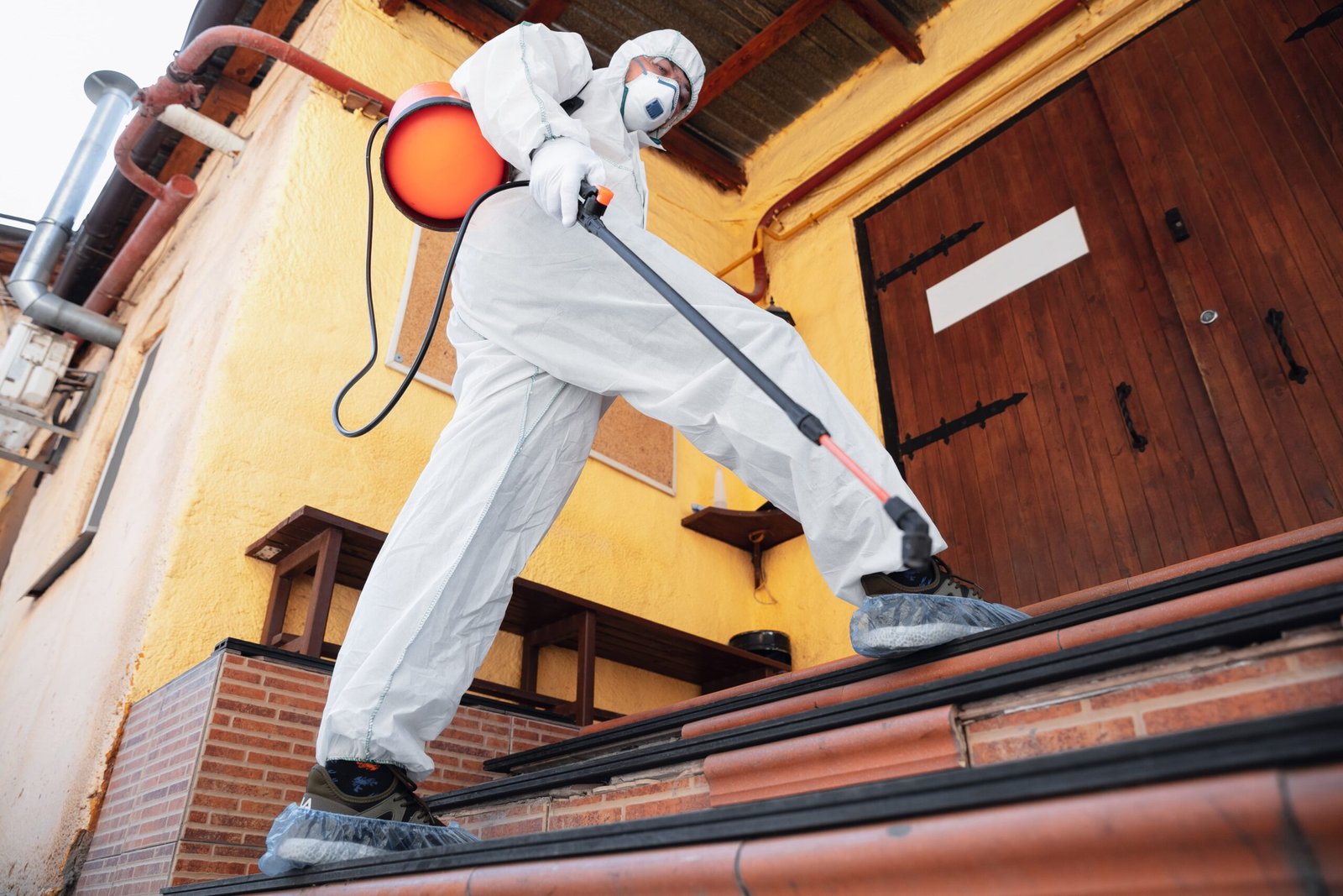 coronavirus-pandemic-disinfector-protective-suit-mask-sprays-disinfectants-house-office